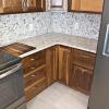 I love the grain in walnut. This kitchen features three Lazy Susans and multiple drawer cabinets to facilitate easy access to pots, pans and gadgets.