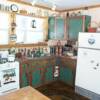 These are simpler plywood cabinets. The doors are made from the wood that was cut out to make the opening and then trimmed in varnished cherry.
