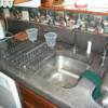 This is a "cast in mold" countertop. Note the under mount sinks and cast in drain board.