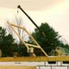 The next few pictures are of a Timber Frame Home that we built. This is the first "bent" being lifted into postition.