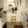 A very small old fashion kitchen.